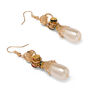 The drop earrings are gold toned and with comfortable hooks.